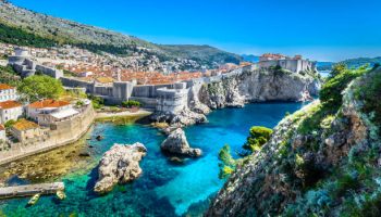 Aerial panoramic view at famous european travel destination, Dubrovnik cityscape on Adriatic Coast, Croatia.